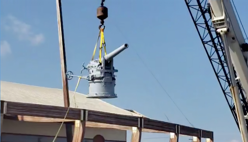 German WWI 88 millimeter cannon is hoisted into place at the Graveyard of the Atlantic Museum. German WWI 88 millimeter cannon is hoisted into place at the Graveyard of the Atlantic Museum.